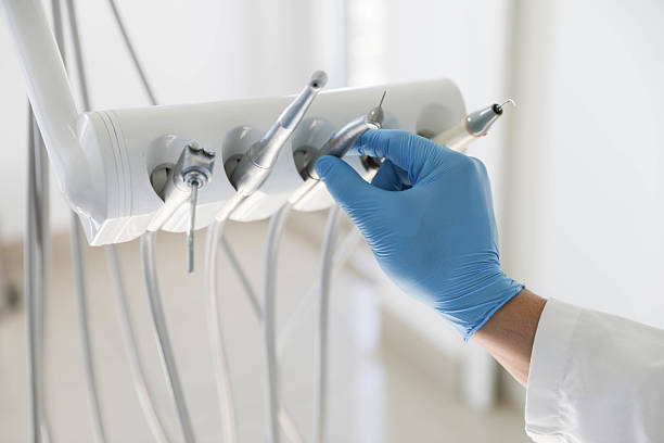 Professional Teeth Whitening technician working in Clayton, MO